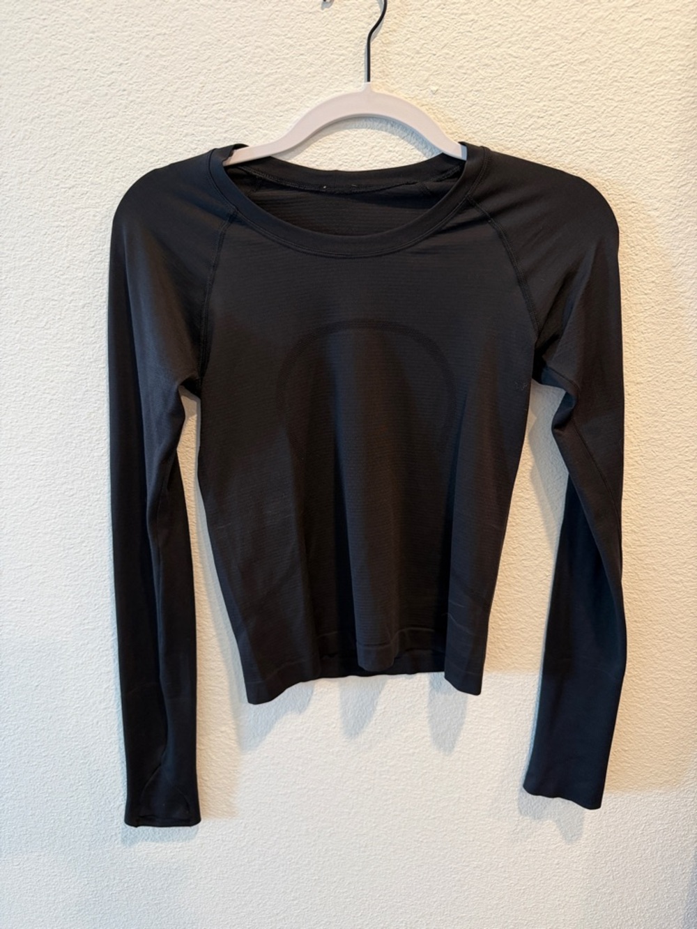 Black swiftly tech long sleeve crop